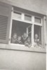 family_looking_out_window