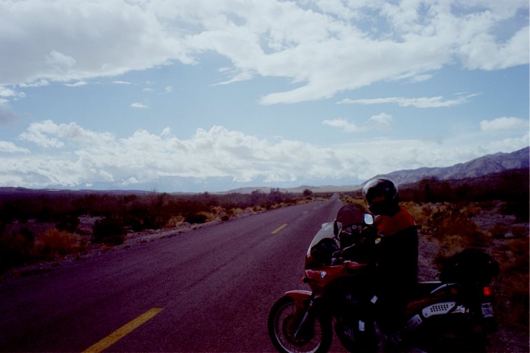 Evan on motorcycle in the desert